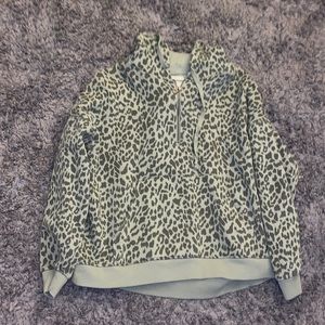 green cheetah half zip